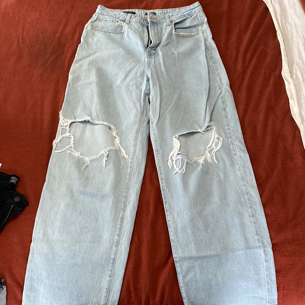 Wild fable wide leg light wash with ripped knees size 12